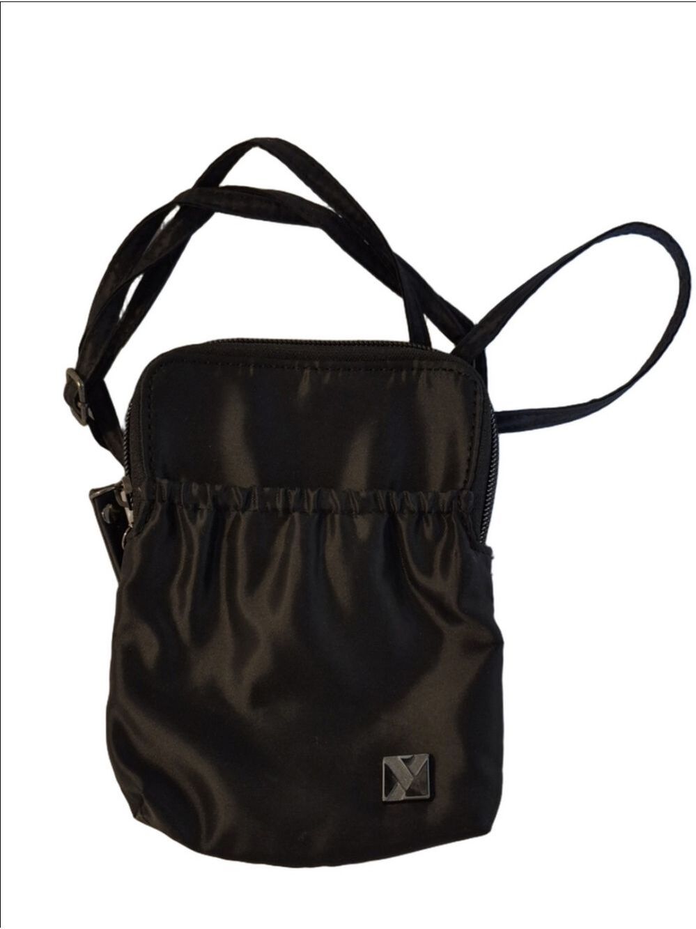 An Anti-theft Travel Organizer  Crossbody Bag With Build -In Card Slots.